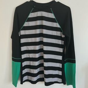 Prana long sleeved shirt stripes on front wrists are green and larger than arms.